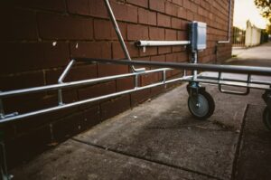 gray and black metal hand rail